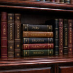 Latin American Stamp Albums on a Bookshelf